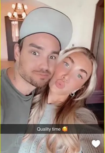 a man and a woman are posing for a picture with the caption quality time