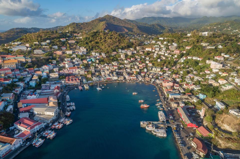 an aerial view of a small town in the caribbean