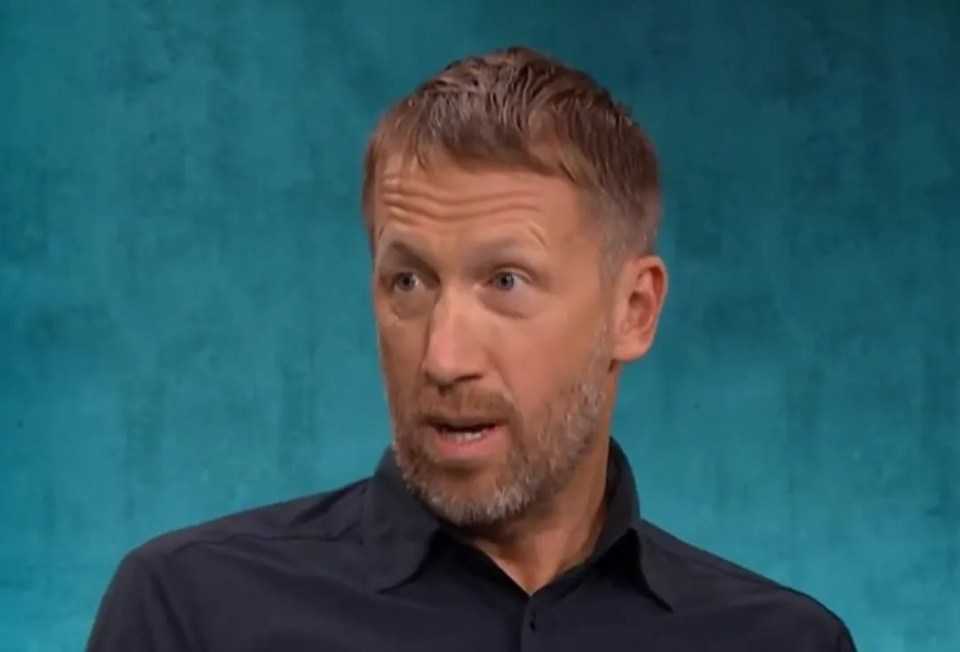 a man with a beard is wearing a black shirt