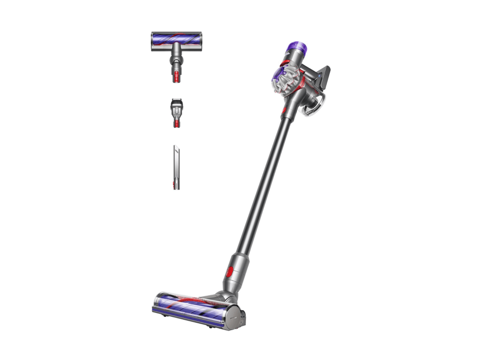 a dyson vacuum cleaner is shown on a green and white background