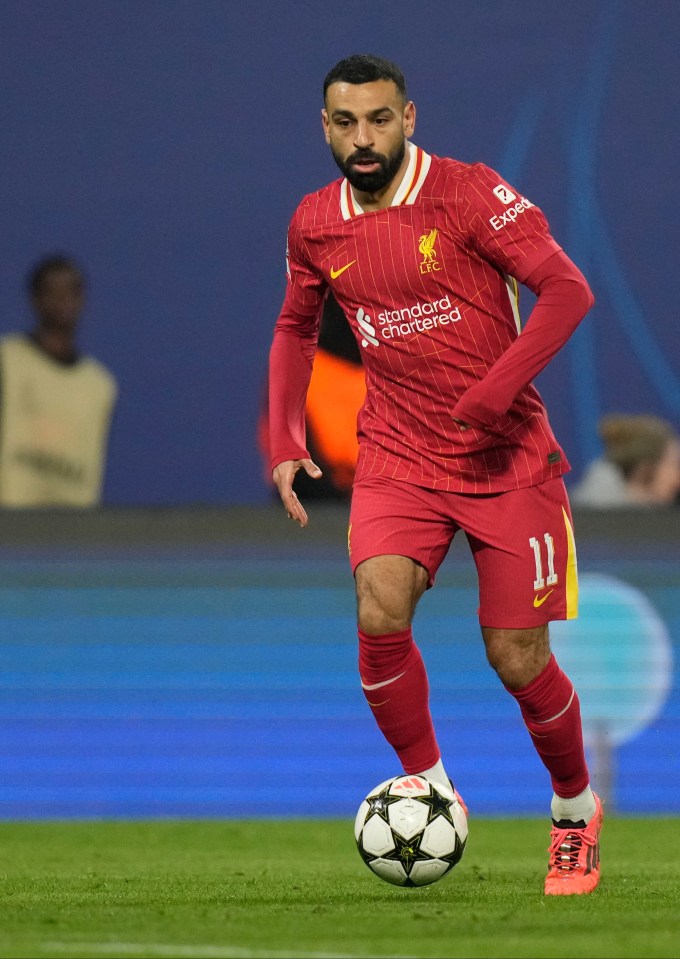 a soccer player with the number 11 on his jersey