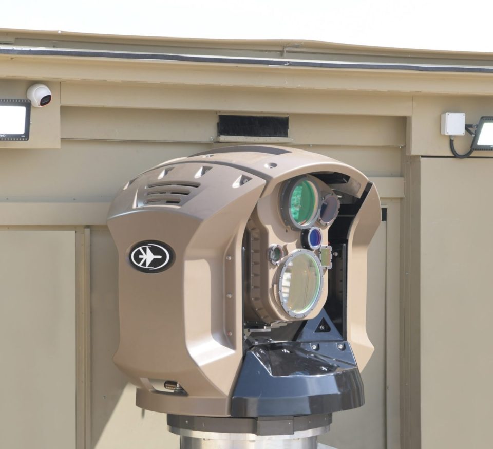 a camera that has the letter k on it