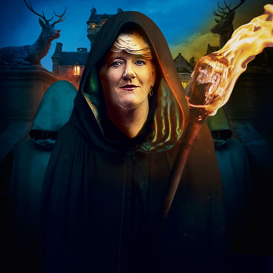 a woman in a black cape is holding a torch