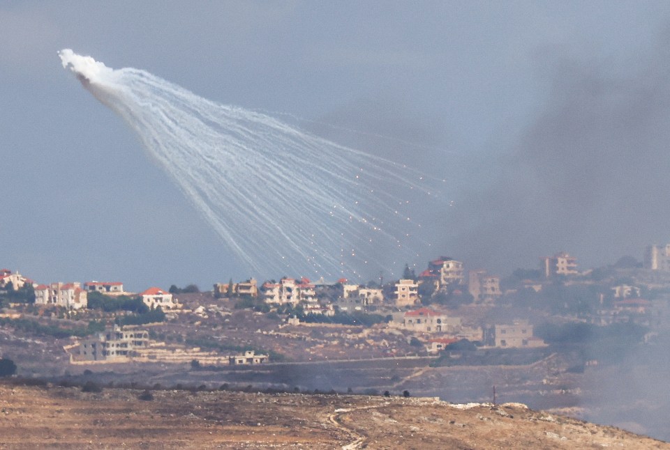a rocket is flying through the air over a residential area