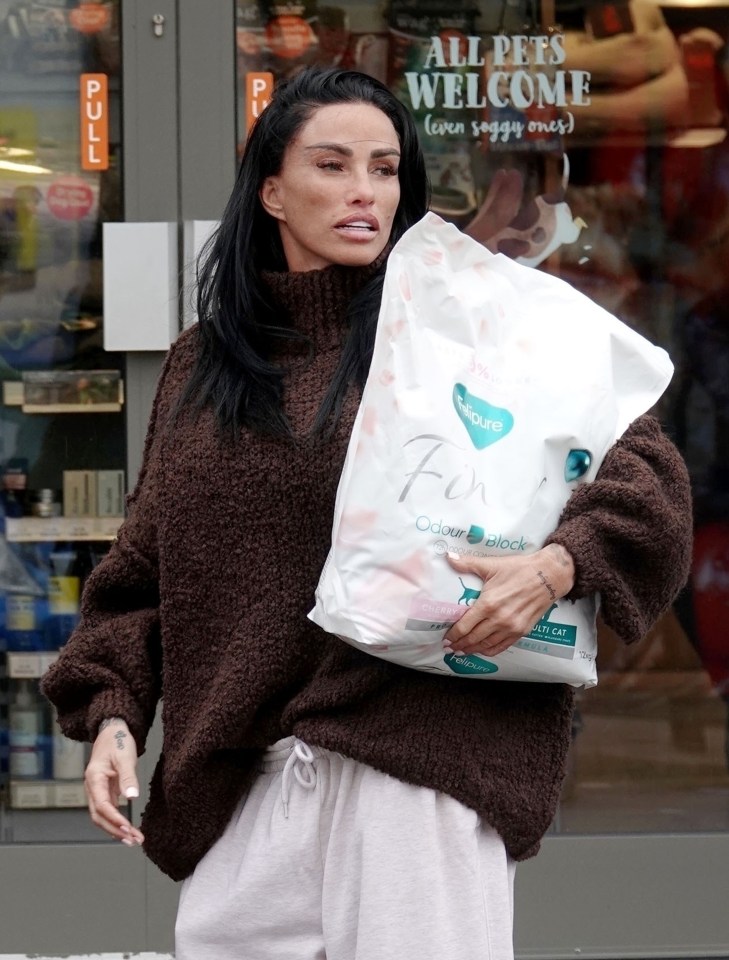a woman holding a bag that says fox on it