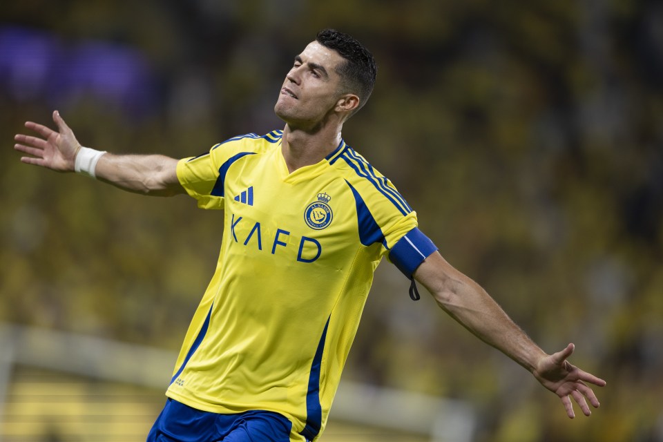 a soccer player in a yellow and blue kafd jersey