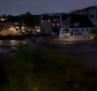 a blurry picture of a city at night