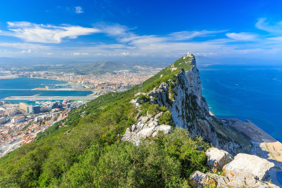 a view of a city from the top of a mountain