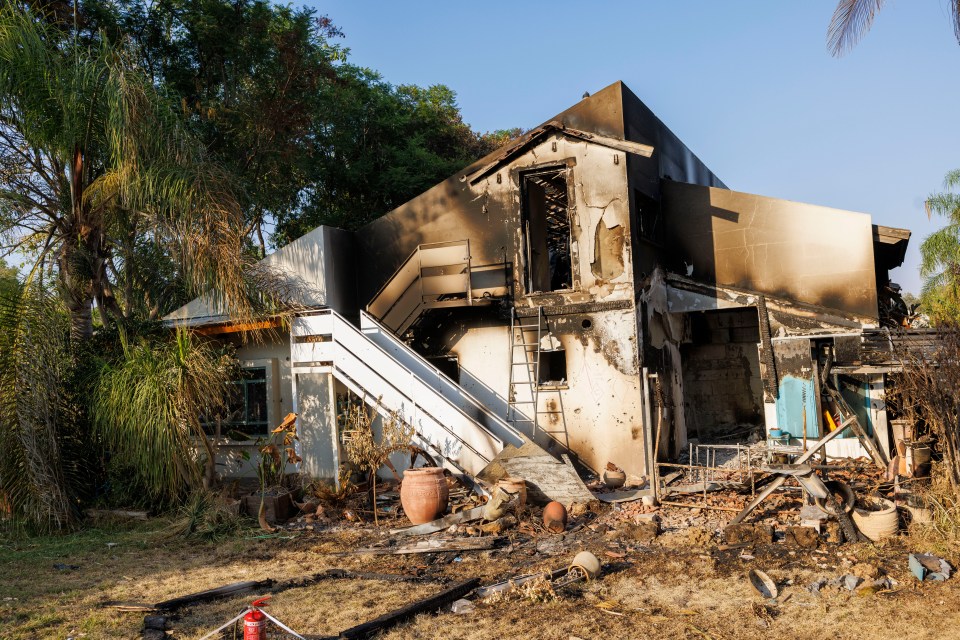 A destroyed home in the village after Hamas' assault