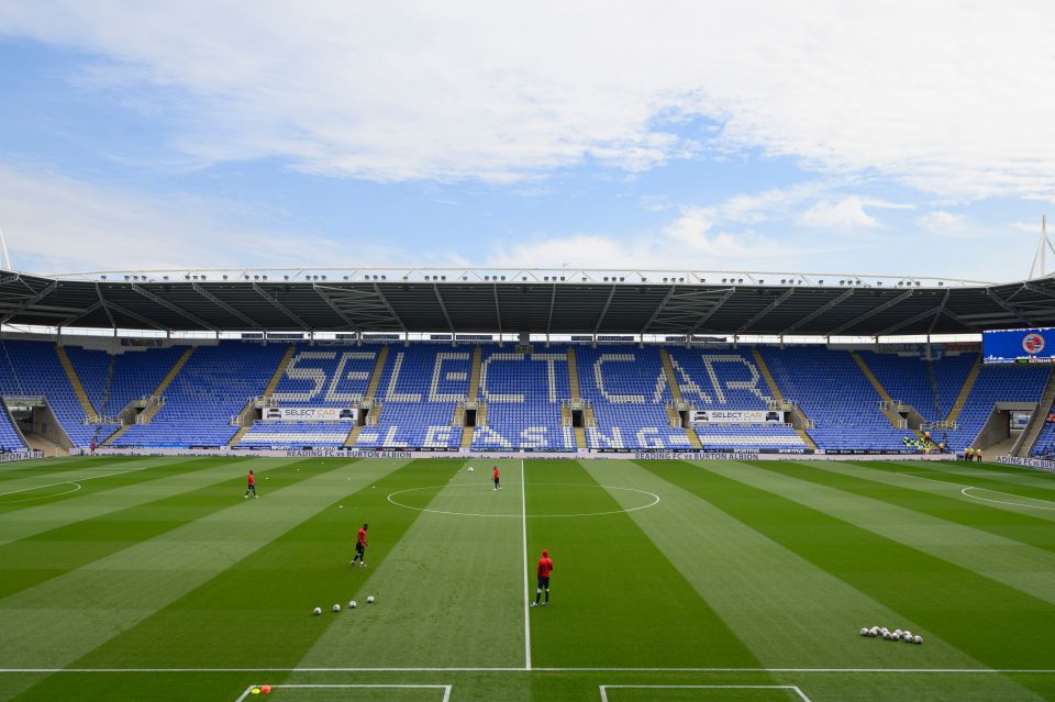 a soccer field with the word select car on the stands