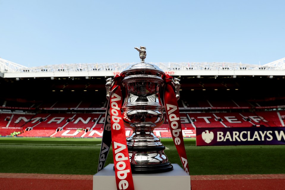 a trophy with a red ribbon that says adobe on it