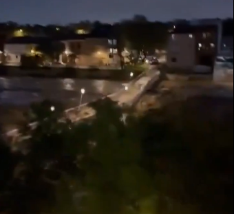 a blurry picture of a residential area at night