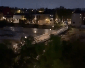 a blurry picture of a residential area at night