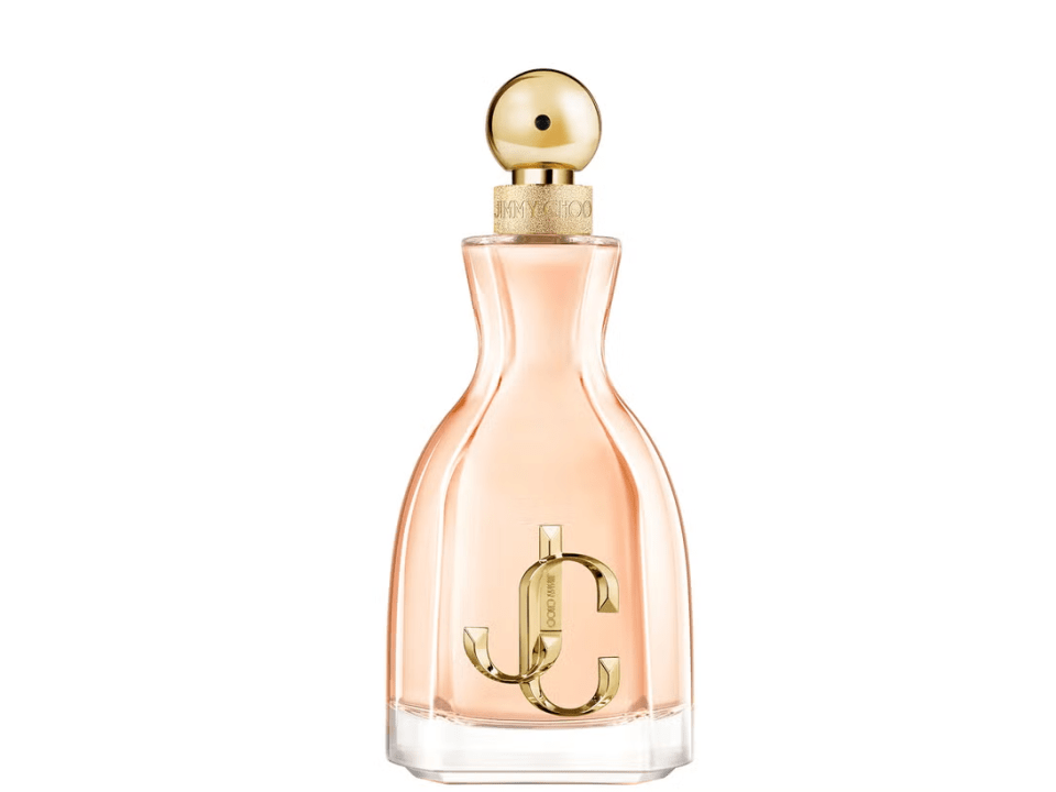 a bottle of jimmy choo perfume on a green background