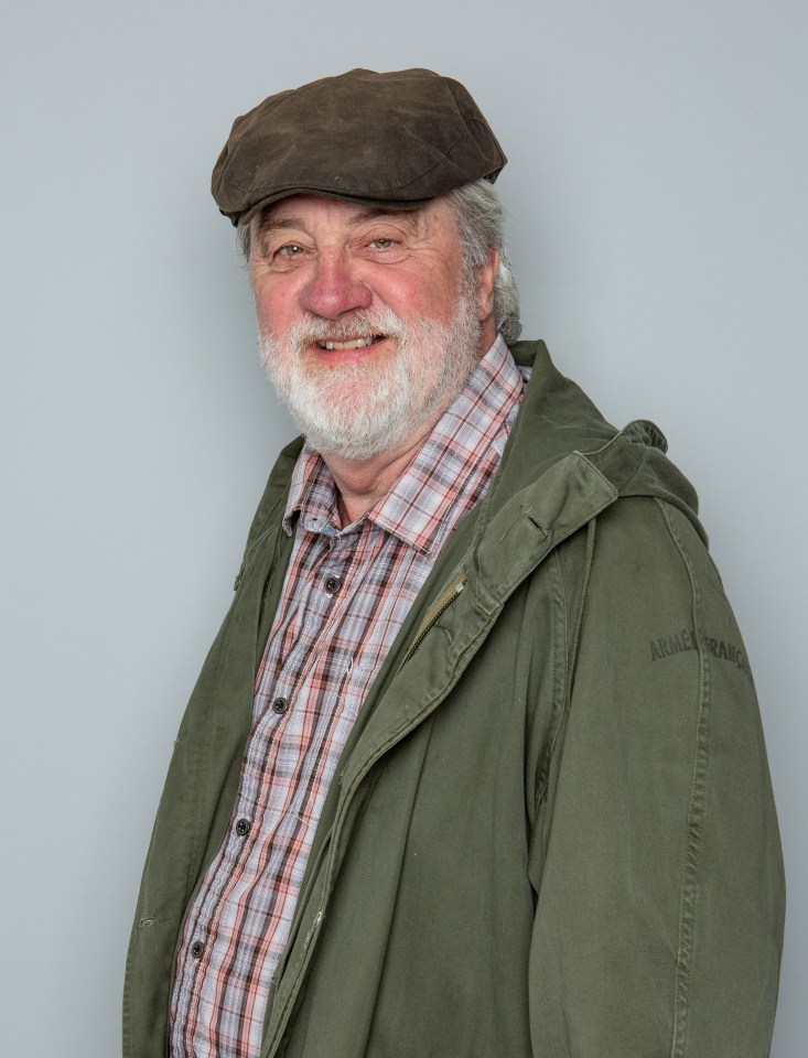 a man wearing a hat and a jacket that says armee france