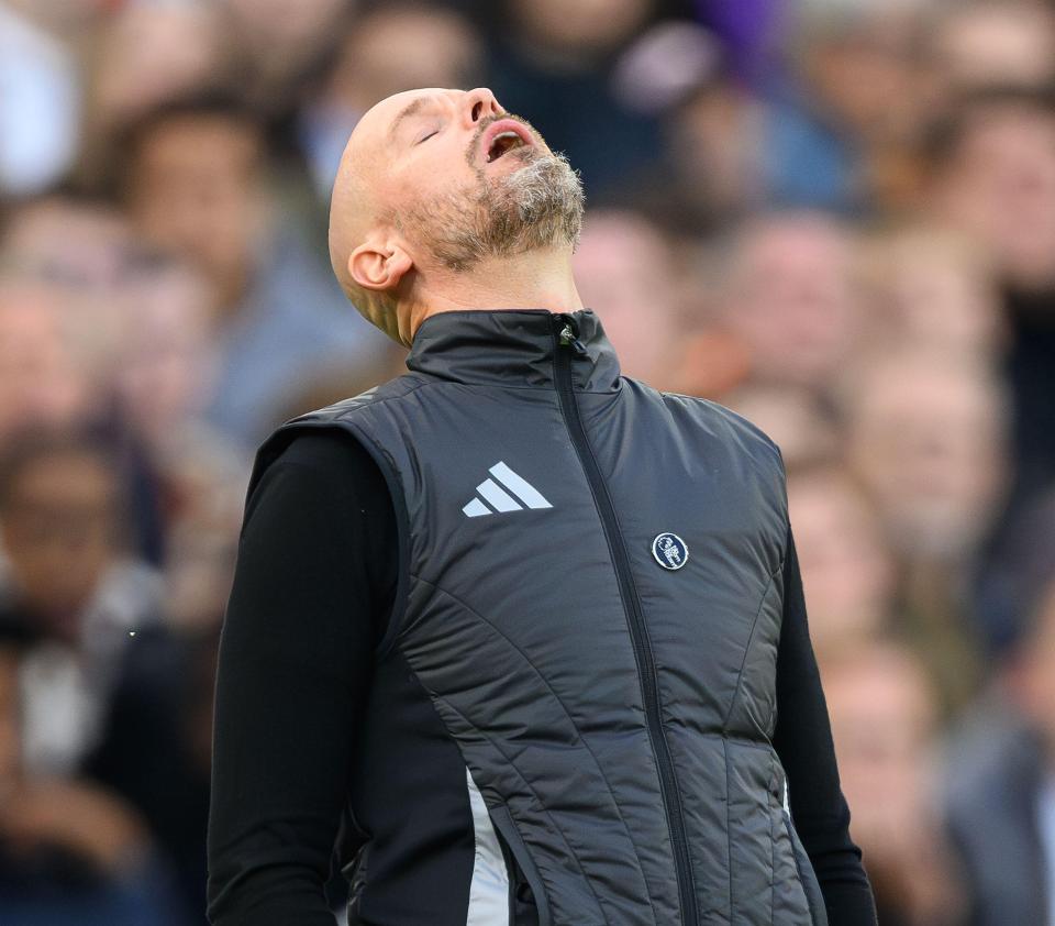 a man wearing an adidas vest looks up at the sky