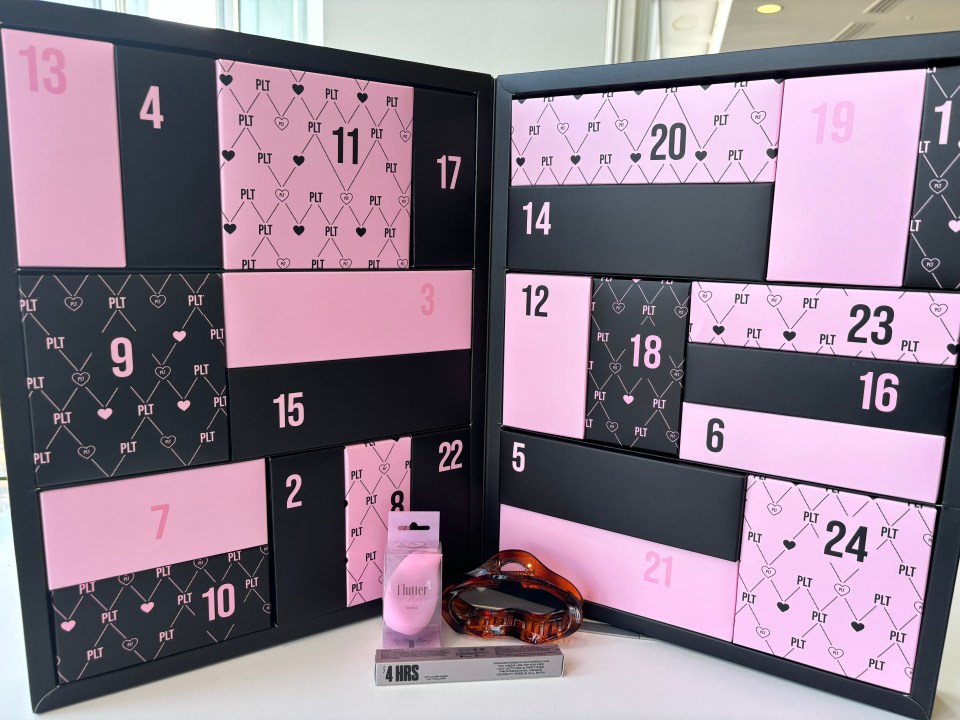 a black and pink advent calendar with the number 13 on it