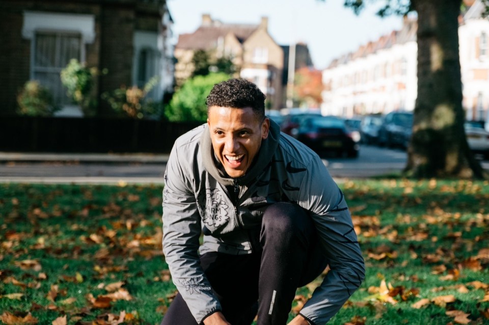 a man wearing a jacket that says nike on it