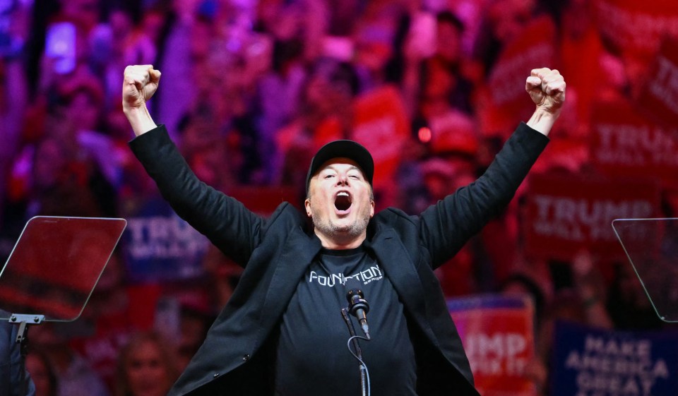 a man wearing a black shirt that says foundation on it