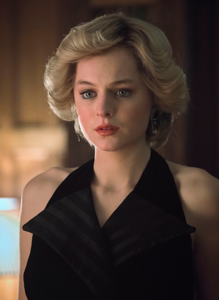 a woman with blonde hair wearing a black dress