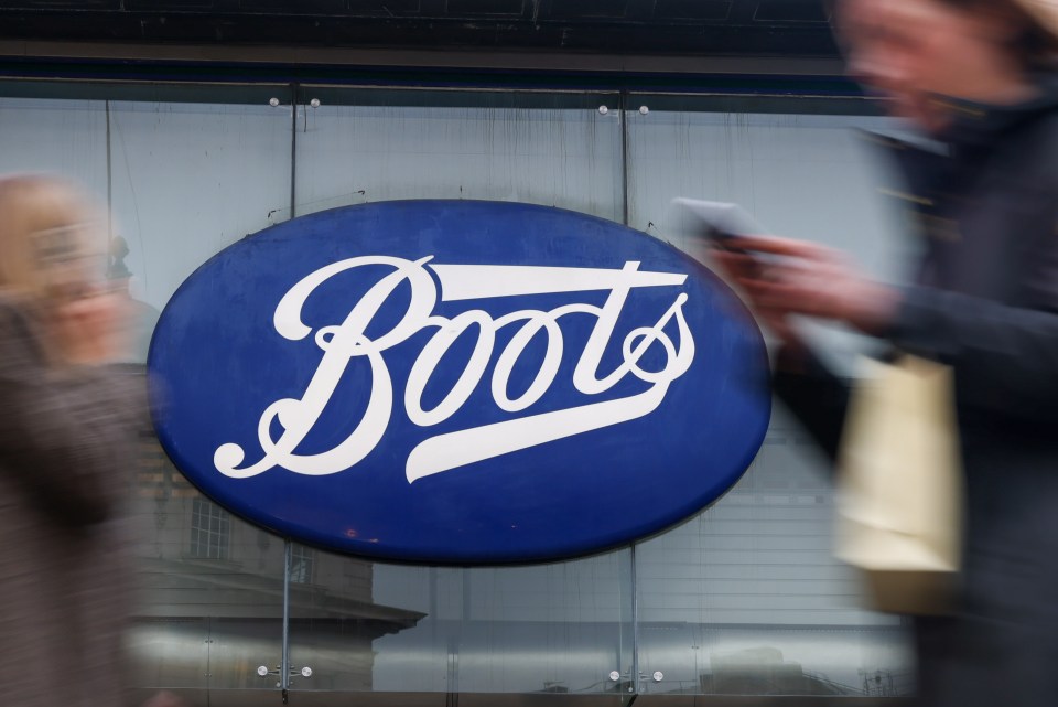 a blue sign that says boots on it
