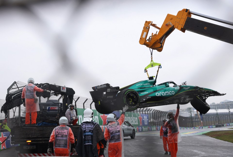 a green race car with the word aramco on the side