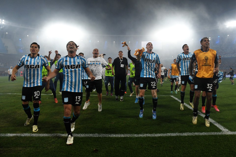 a group of soccer players wearing jerseys that say rca