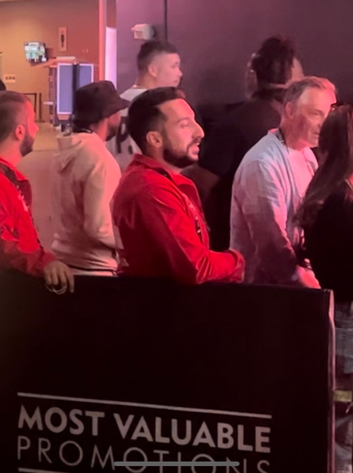 a group of people are standing in front of a sign that says most valuable promotions