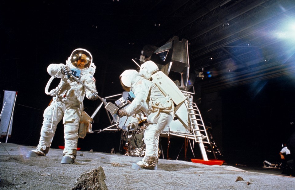 a photo of two astronauts on the moon taken in 1969