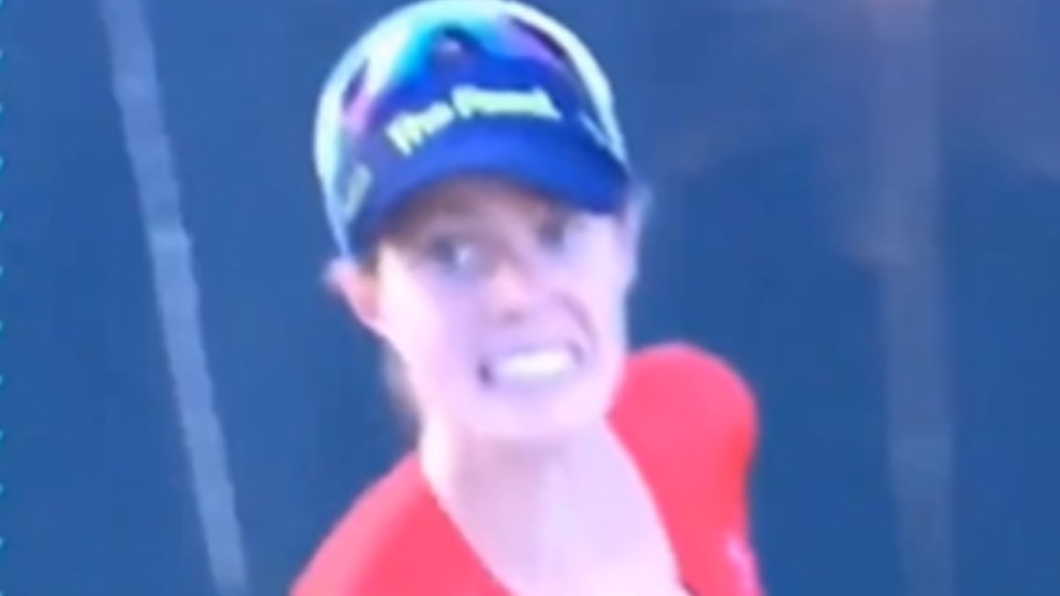 a woman wearing a blue hat that says pro pound