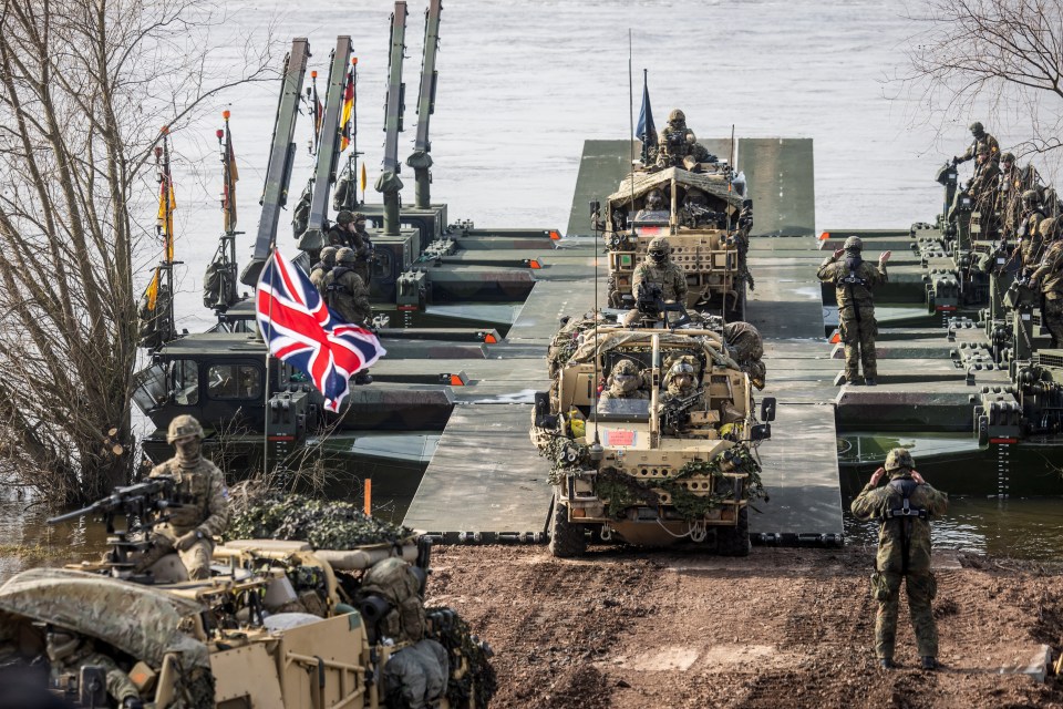 British soldiers cross the Vistula river as they take part in NATO DRAGON 2024 military exercise in Korzeniewo, Northern Poland, March 4, 2024. (Photo by Wojtek Radwanski / AFP) (Photo by WOJTEK RADWANSKI/AFP via Getty Images)