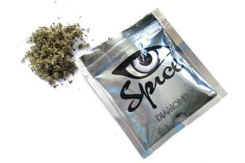 a bag of spice diamond next to a pile of spice