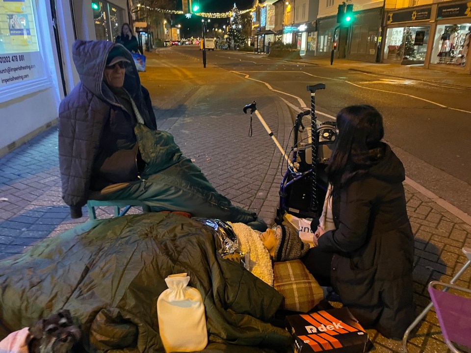 A 95-year-old woman was left lying on the pavement with a broken hip in "freezing" weather for five hours