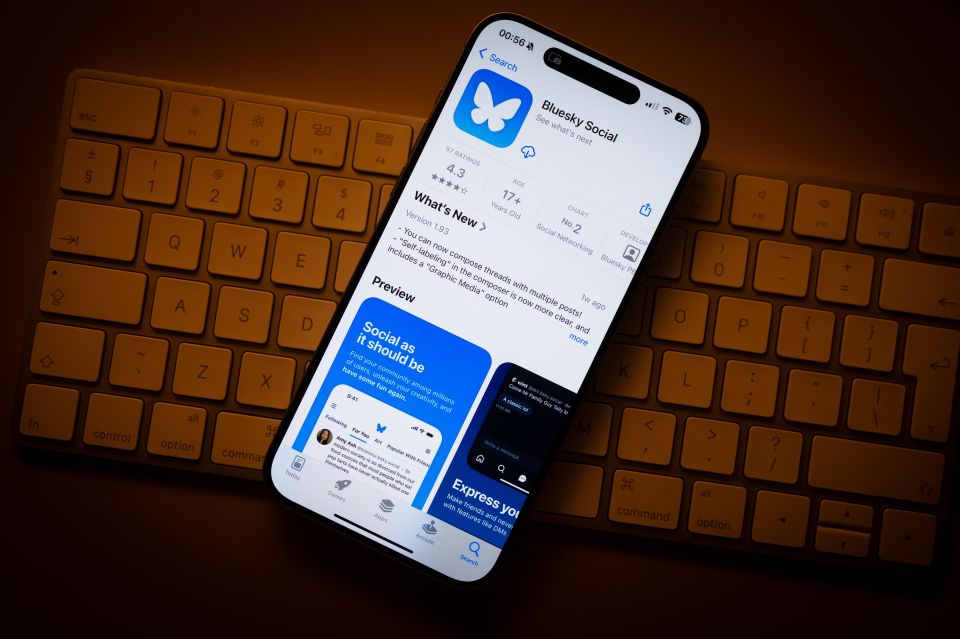 a phone is open to the bluesky social app