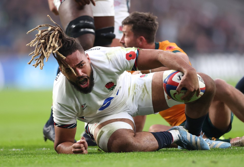 a rugby player with the number 8 on his jersey