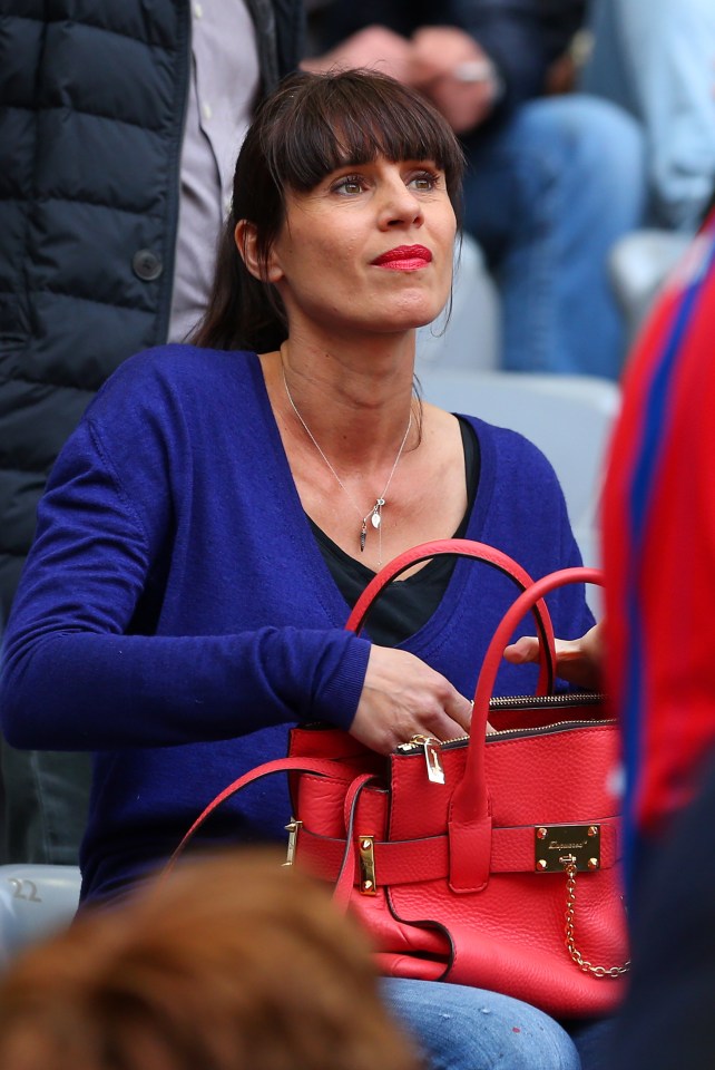 Cristina Serra, wife of Pep Guardiola, at a soccer game.