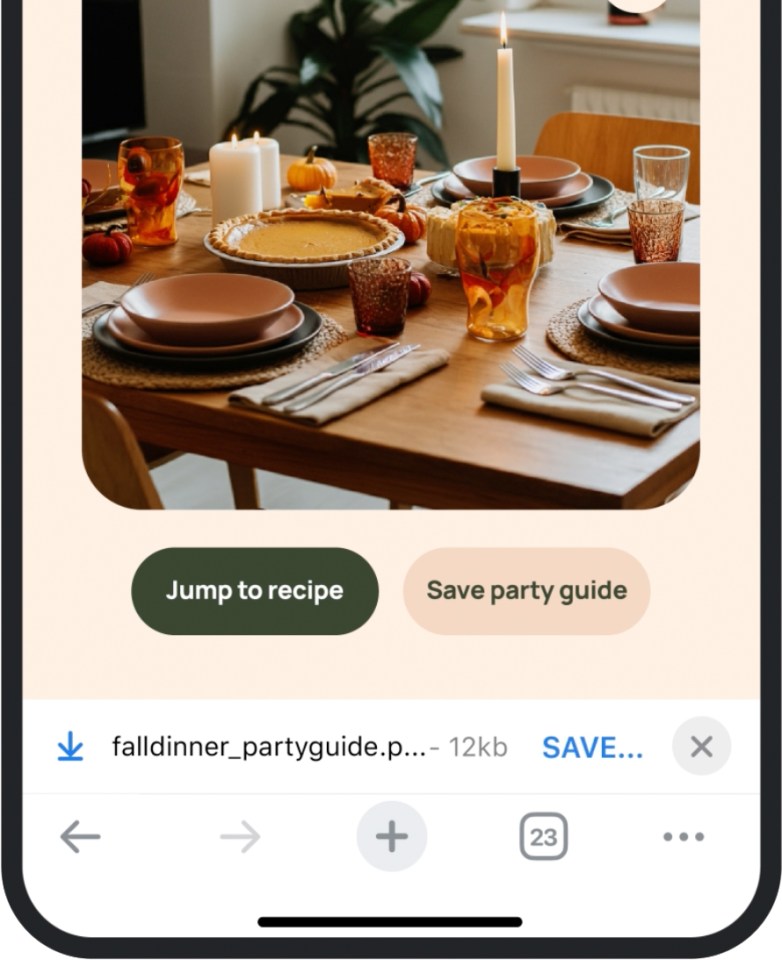 a phone screen shows a table with plates and candles and a jump to recipe button