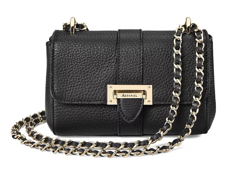 a black purse with the word aspiral on it