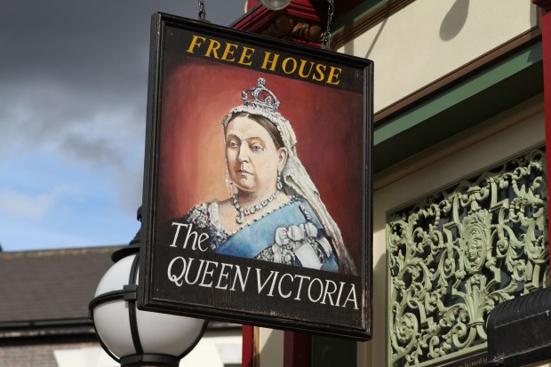 Pub sign for the Queen Victoria, a free house.