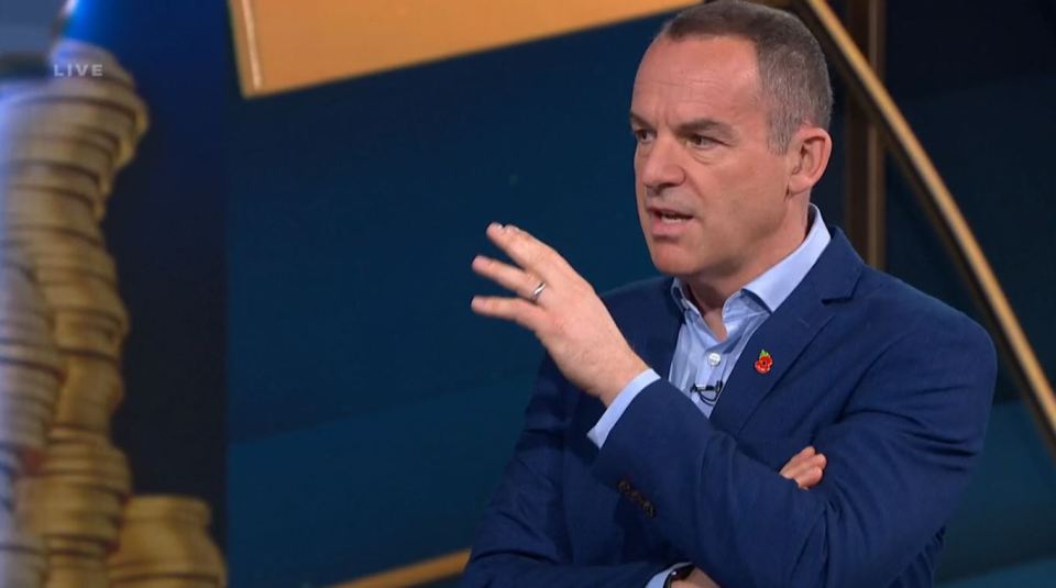 a man in a blue suit is on a live show