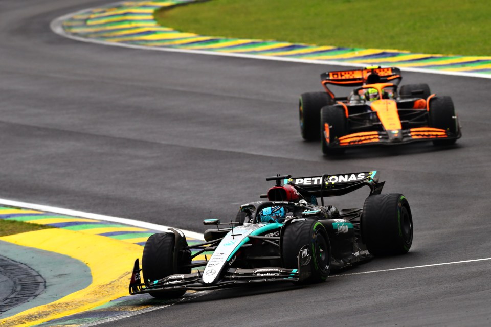 a race car with the word petronas on the side