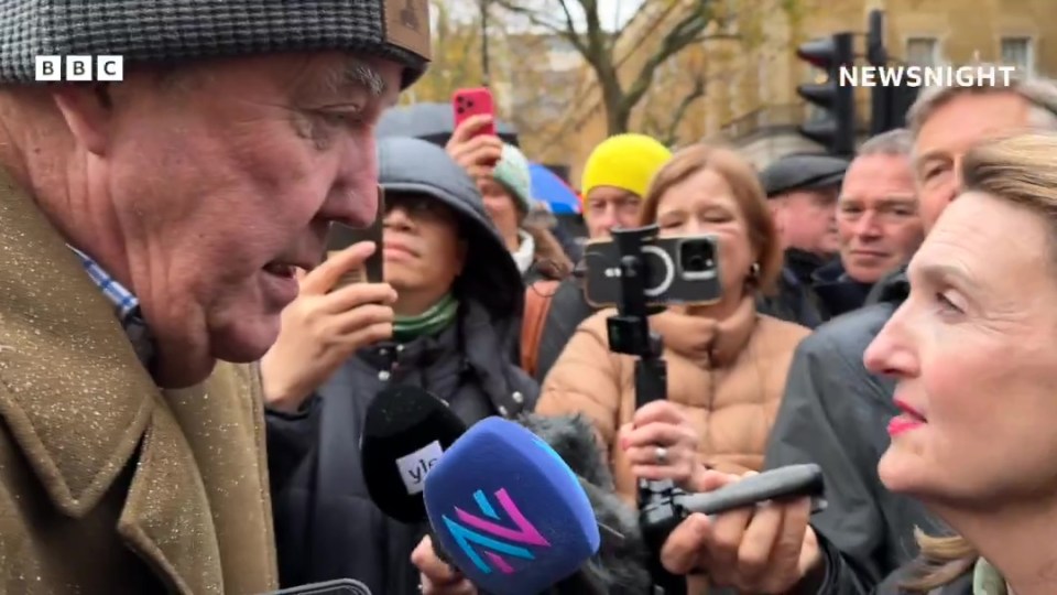 a man is talking into a bbc microphone