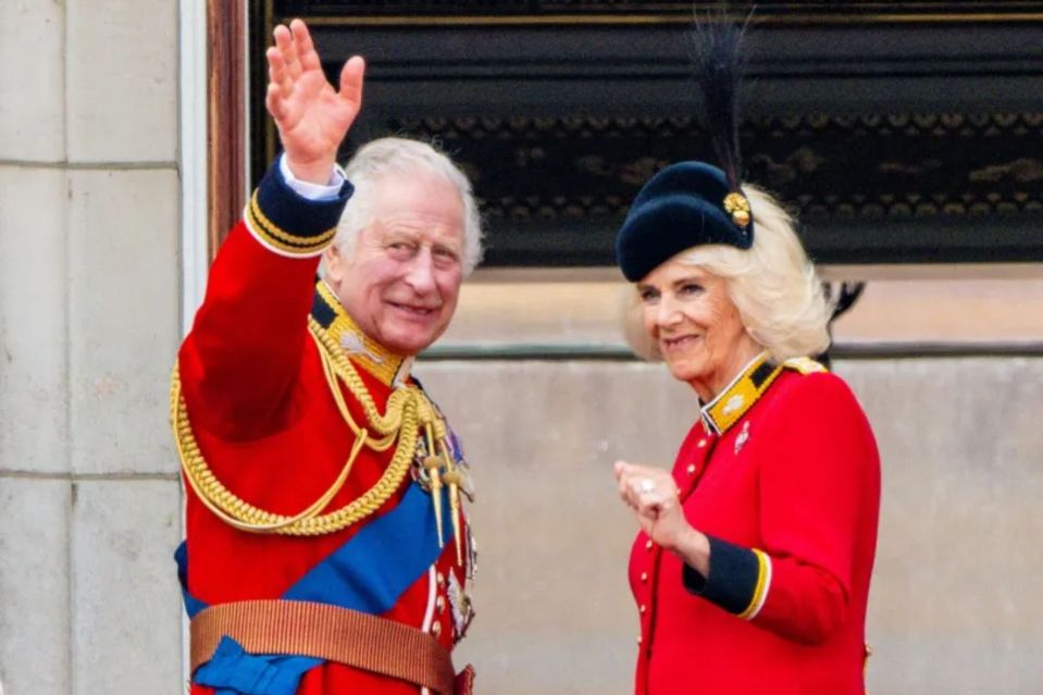 a man and woman in red uniforms are standing next to each other
