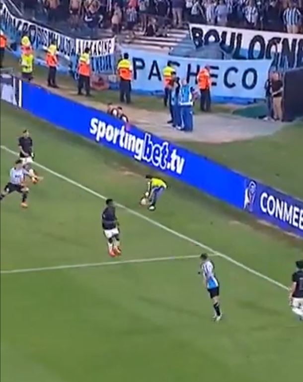 a soccer field with a banner that says sportingbet.tv