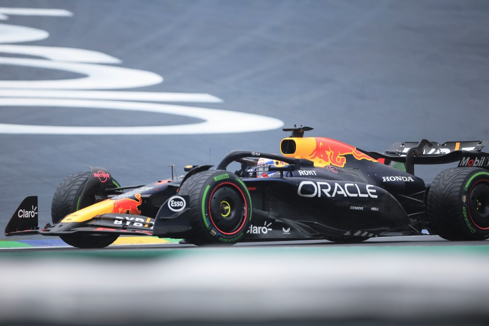 a race car with the word oracle on the side