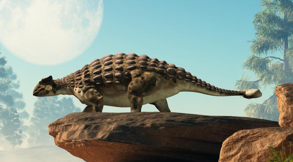 an illustration of a dinosaur standing on a rock