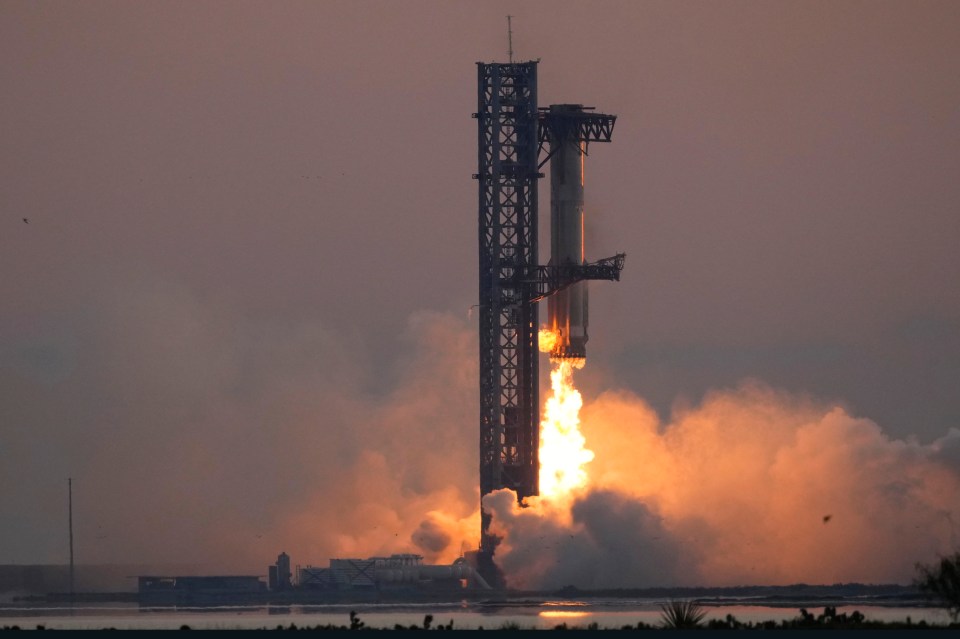 a large rocket is being launched into space