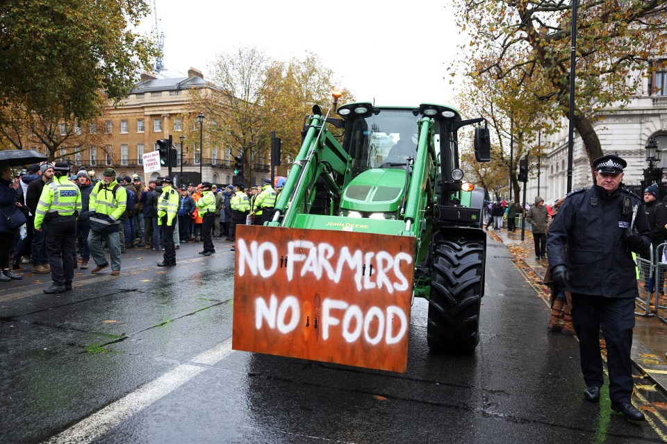 A tractor drives past Downing Street during a demonstration in London this week