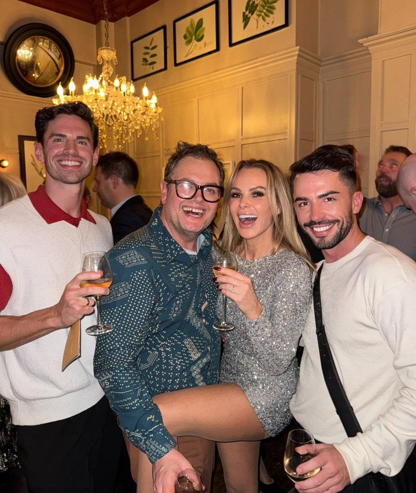 Amanda Holden at a Christmas party with friends.