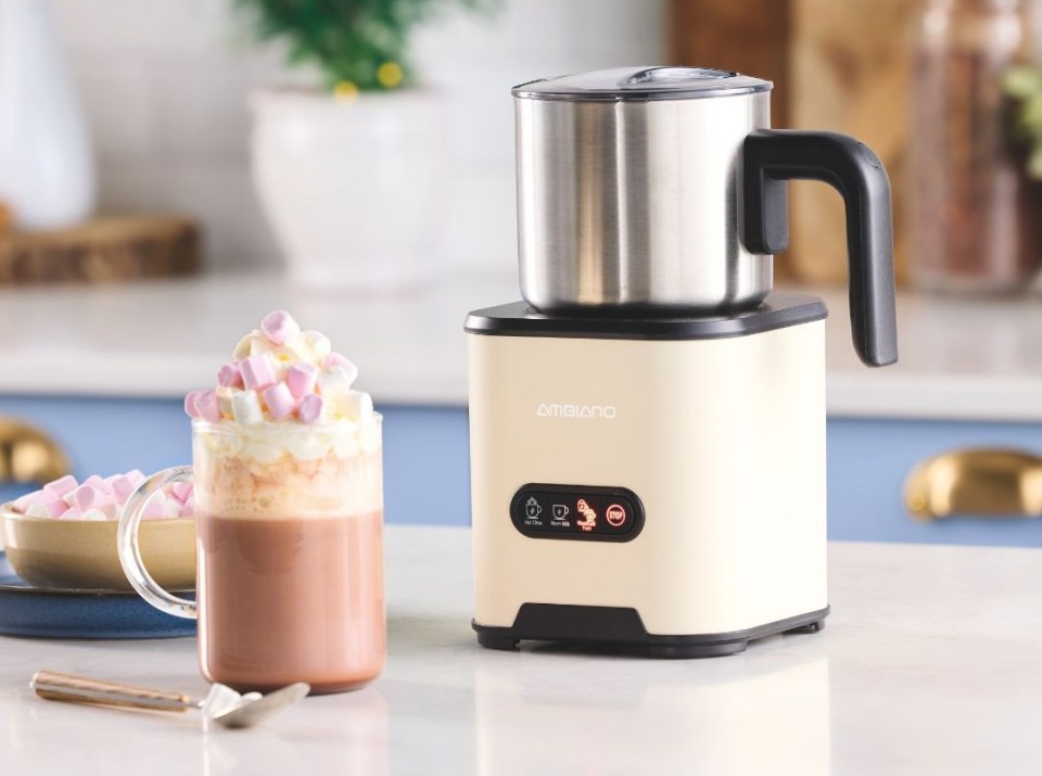 Ambiano hot chocolate machine with a mug of hot chocolate topped with marshmallows.